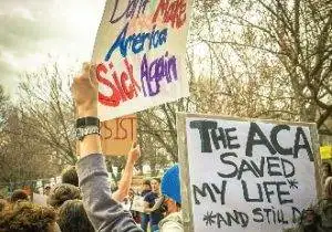 people demonstrating support for the affordable care act.