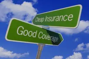 image showing cheap insurance and good coverage pointed in different directions.