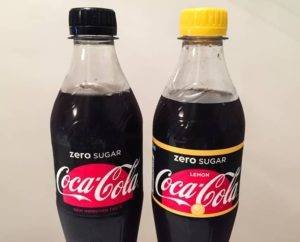 Bottles of sugar free coca-cola.