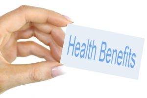 Hand held copy of the words "Health Benefits"
