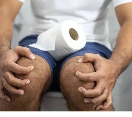Will protein powder cause constipation? 3 A constipated man trying to defecate.